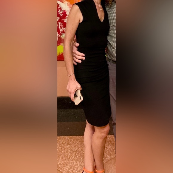 Black cocktail dress with gold zipper down the back. - Picture 2 of 5